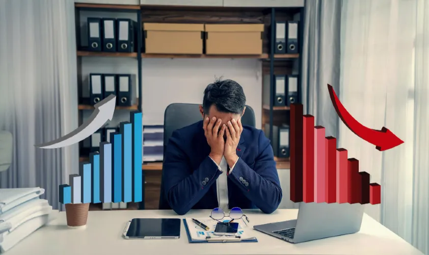 Another recession another failure laptop displaying a business graph person working on data analysis technology and finance recession concept